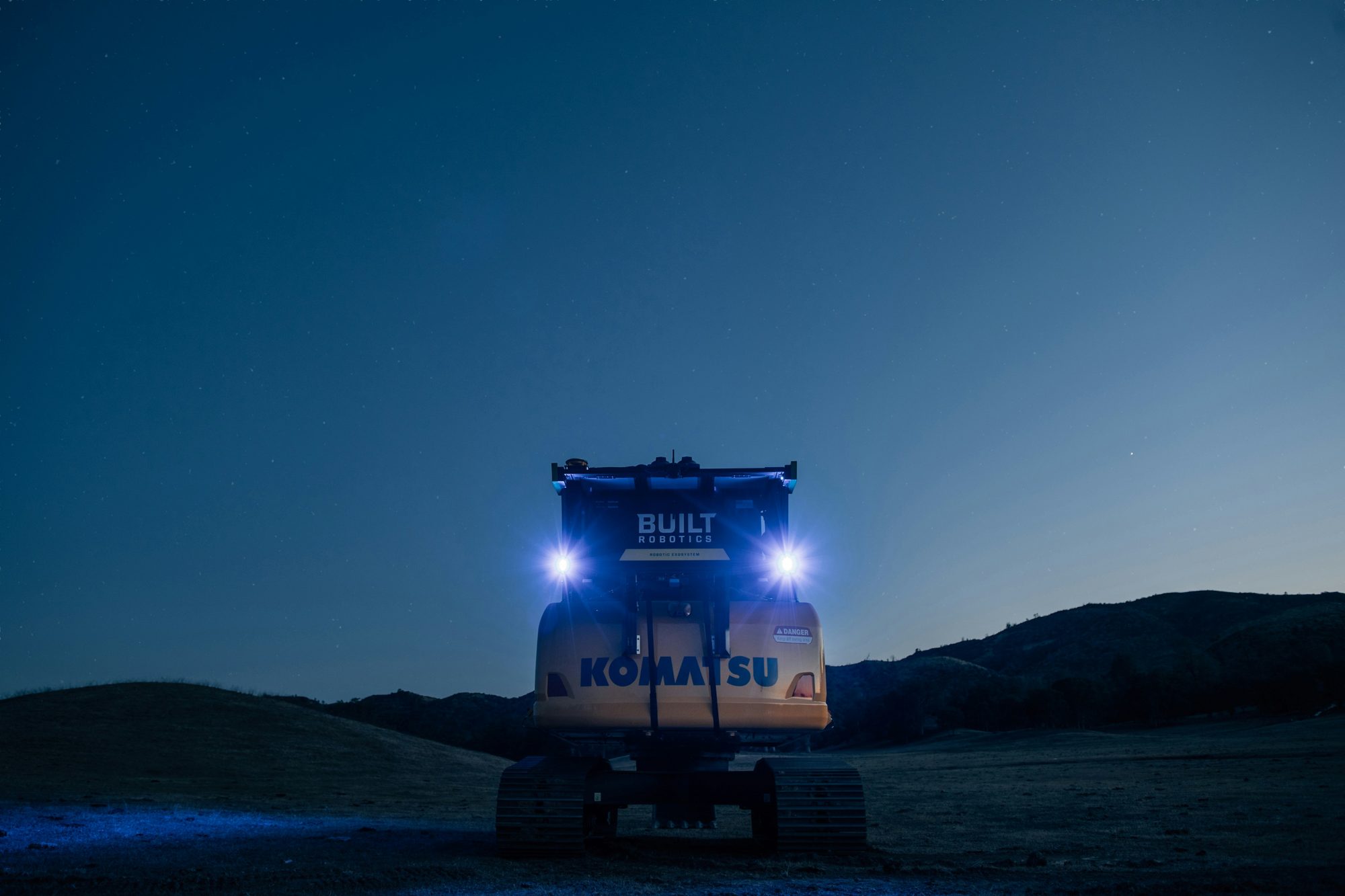 Autonomous robotic excavator working at dusk