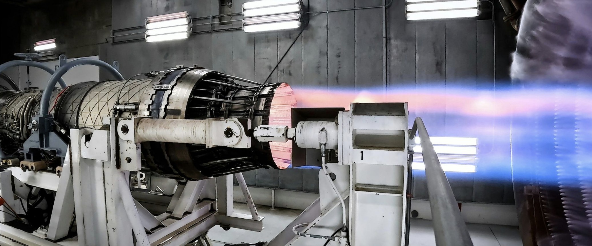 Jet engine test rig firing, illustrating a technology being pushed from lab testing toward real-world performance